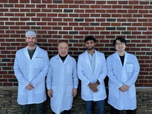 Garrisonville Dental doctors in a group smiling